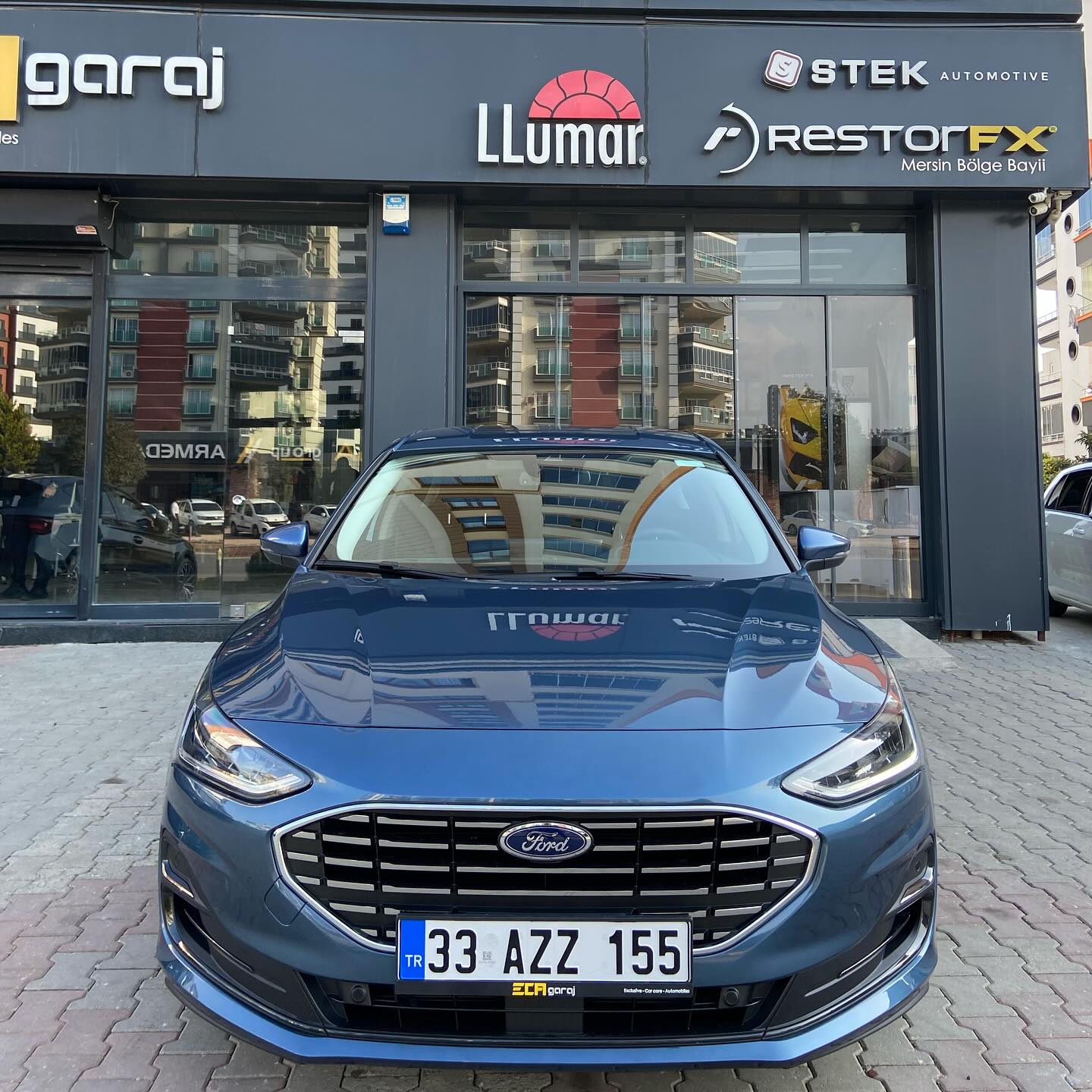 2024 Model 0 KM FORD FOCUS ✨ Yapılan işlemler; ~STEK DYNOlite PPF kaplama 🛡️ ~STEK cam filmi carbon black serisi ☀️ ~ClearFX Seramik kaplama 💎 #ecagaraj #mersin #llumar #stek #clearfx #0km #ford #focus #blue #fordcars #carphotography #explorar #diomand